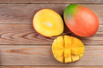 Top view of Sliced mango on a rustic wooden table.