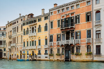 View of architecture of Venice from Grand Canal. Beautiful colorful houses on narrow water streets, Venice, Italy. High quality photo