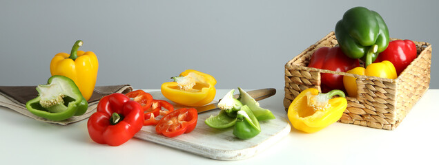 Concept of tasty food with bell pepper on white table