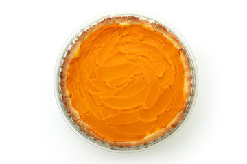 Pumpkin pie isolated on white background, top view
