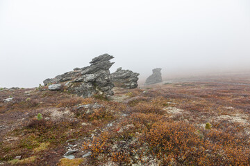 High mountain in mist and cloud.