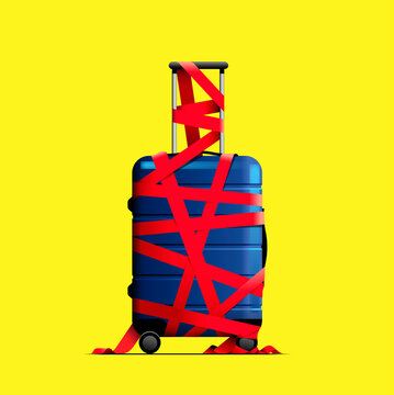 Suitcase tied up in red tape 
