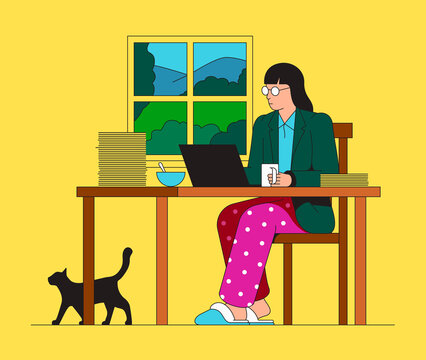 Woman working from home wearing pyjamas on bottom half