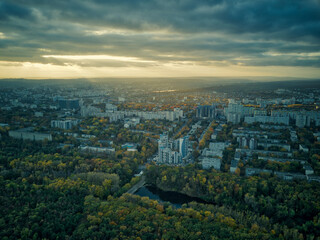 Fototapeta na wymiar Aerial over the city in autumn at sunset. Kihinev city, Moldova republic of.