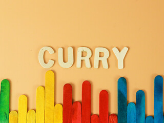 Terengganu, Malaysia-October 27,2021 :Wooden Curry Word With Blue Background