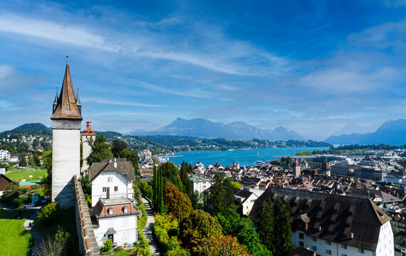 View of the Swiss city of Lucerne with the lake and the alps in the background. Photograph taken from one of the towers of the 14th century Museggmauer wall.