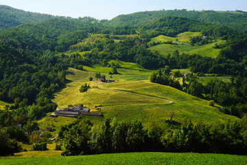 Fototapeta na wymiar Rural landscape along the road from Pavullo nel Frignano to Polinago, Emilia-Romagna.