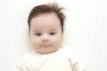 Fototapeta premium Adorable baby boy two months old isolated on a white background 
