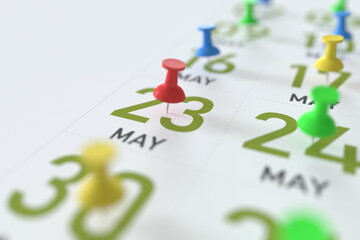 May 23 date marked with red pushpin on a calendar, 3D rendering