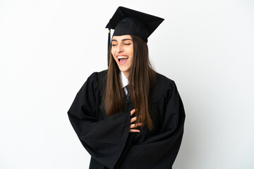 Young university graduate isolated on white background smiling a lot