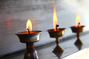 Buddhist Old Altar Candles at Religious Butter Lamp Festival in Temple Monastery