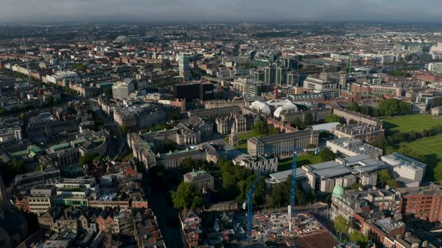 Aerial panoramic shot of Trinity College complex. Historic university buildings around Parliament Square. Dublin, Ireland