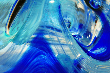 Vibrant Abstract Glass Swirls and Bubbles from a Paperweight with Lines and Colours