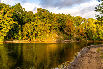 Beautiful scenery of the autumn colors view in St. Joseph River in a sunny day