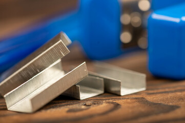 Stationery stapler, stapler staples, close-up, selective focus.