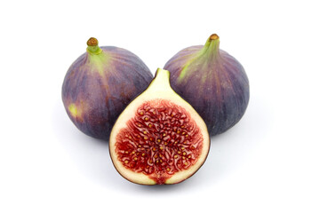 Fig fruit with ripe red half isolated on white