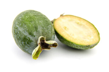 Feijoa fruit or whole and half pineapple guava isolated on white