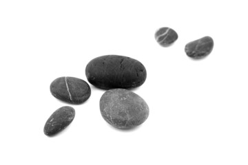 Fototapeta na wymiar Smooth pebble stones isolated on white