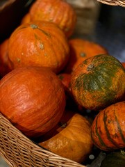 basket with pumpkins in the market