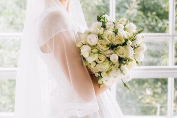 bride holding a beautiful wedding bouquet