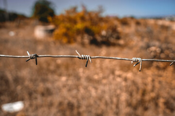 Barbed iron wire stretched outside