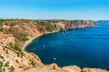 Panoramic sea view on Cape Fiolent in Crimea. A famous place for tourists on the Black Sea coast with azure water