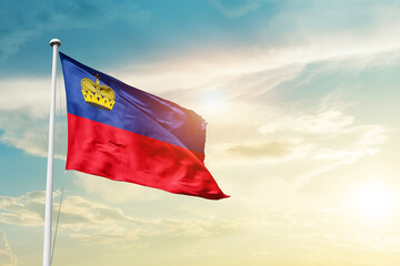 Liechtenstein national flag cloth fabric waving on the sky - Image