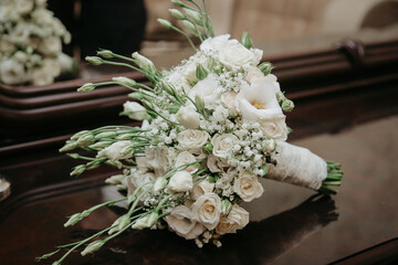 Close view bride bouquet.  Modern wedding bouquet on table.