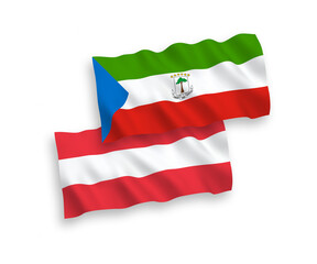 National vector fabric wave flags of Austria and Republic of Equatorial Guinea isolated on white background. 1 to 2 proportion.