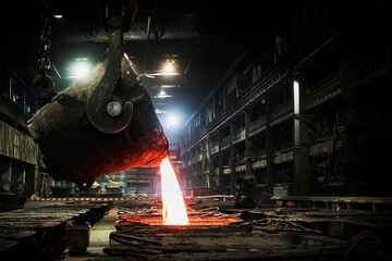 Metallurgical plant. Broken metal from a huge ladle