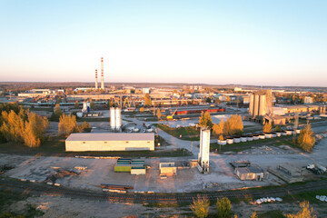 Ready mix concrete batching plant. Producing сoncrete and portland cement mortar for construction and formworks. Cement plant with pipes. Сement production process and Industrial solution.