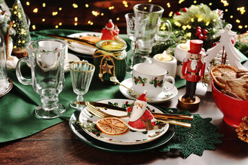 Christmas table setting in green white red colors