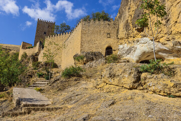 Fototapeta premium Standing next to the walls of the Yedra castle rising up above the town of Cazorla