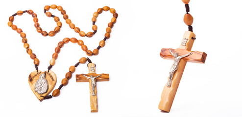 Traditional christian holy religious symbol  wooden rosary isolated on white background