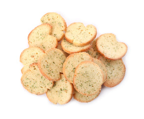 Heap of crispy rusks with seasoning on white background, top view