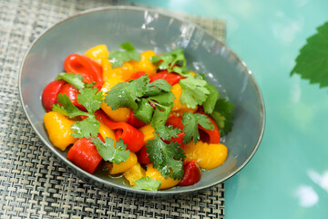 Roasted peppers appetizer with fresh cilantro