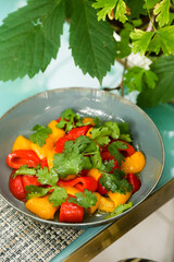 Roasted peppers appetizer with fresh cilantro