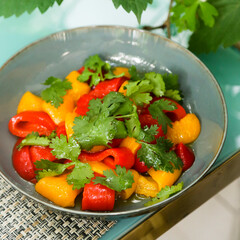 Roasted peppers appetizer with fresh cilantro