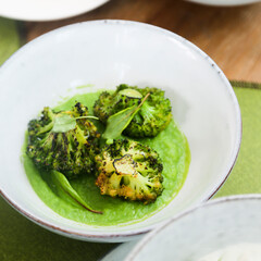Roasted broccoli with pea puree