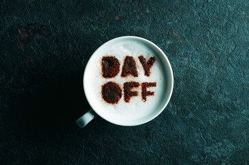 text day-off in a cup of cappuccino