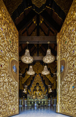 Lampang, Thailand - Sep 04, 2019 : Looking through the beautiful architecture temple door of The...