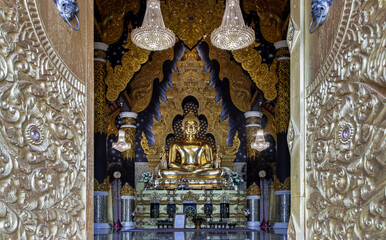 Lampang, Thailand - Sep 04, 2019 : Looking through the beautiful architecture temple door of The...