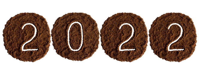 2022 decorated with ground coffee on white background