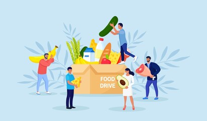 Food Donation concept. Tiny People Filling Cardboard Donation Box with Different Products for Help to Poor People in Shelter. Volunteering and Charity, Humanitarian Relief. Volunteer Donate Groceries.