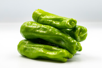 Cubanelle Peppers on white background with shadow. close up