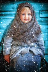 little girl in a scarf.  Winter. New Year