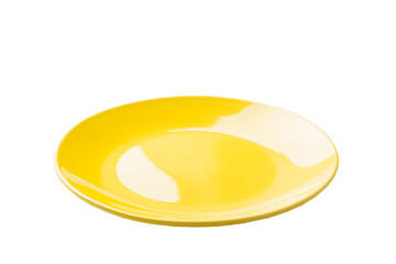 Yellow ceramic round plate isolated over white background. perspective view