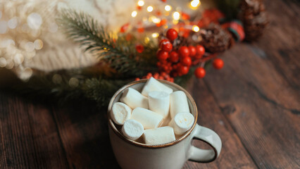 coffee with marshmallows in a cup on the background of a Christmas decor , the concept of Christmas