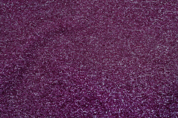 Dark violet fabric textured background.