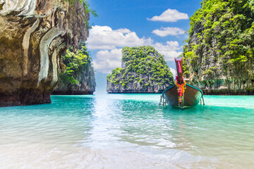 Thai traditional wooden longtail boat and beautiful beach, Thailand. - obrazy, fototapety, plakaty